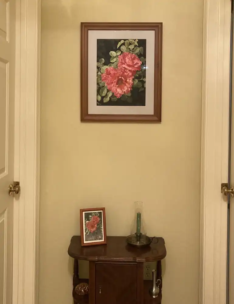 Penny&rsquo;s painting hanging at the end of the hall
